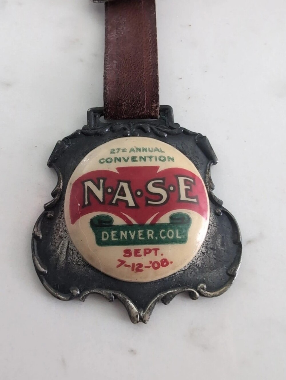 N.A.S.E. 27th Annual Convention Vintage Badge - Red & Cream